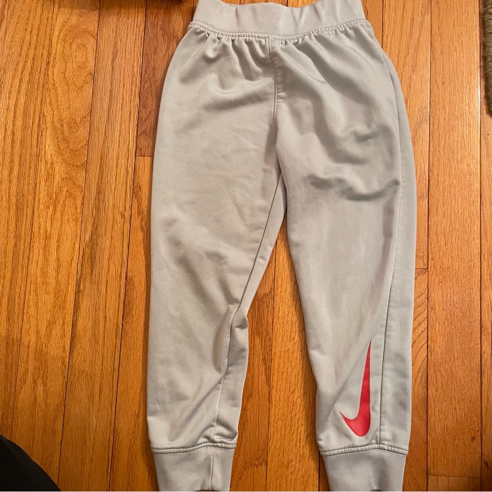Nike little boys athletic joggers/pants. 4T. Light grey with red swoosh.